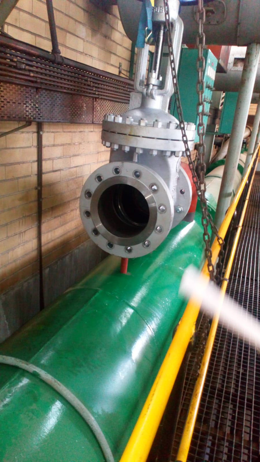 Large industrial valve installation on a pipeline.